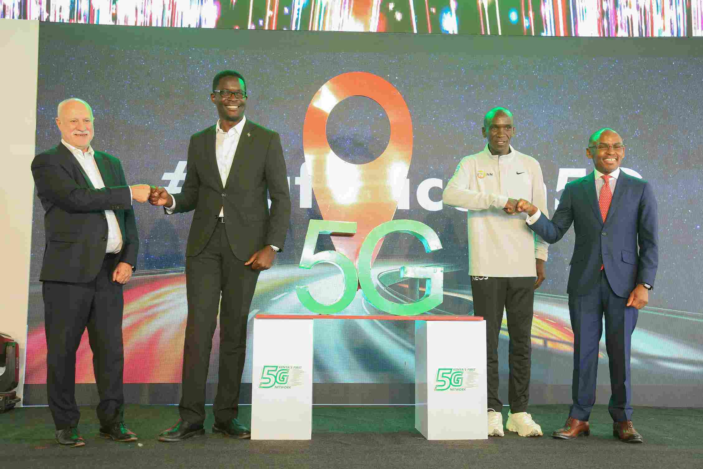 Safaricom PLC CEO, Peter Ndegwa (right) Marathon World Record Holder, Eliud Kipchoge (second right) CAK Director General, Ezra Chiloba (second left) and Safaricom Board Member, Michael Joseph pose for a photo during the Safaricom 5G Commercial Announcement at Yaya center.