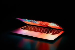 A slightly open laptop silhouette