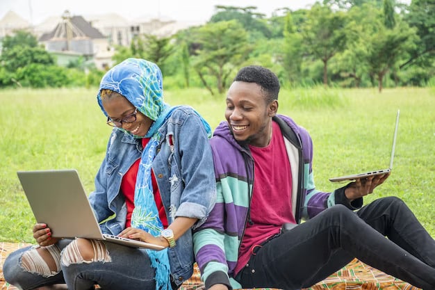 KICTANet Secures Two people using a computer and phone with a green scenery.