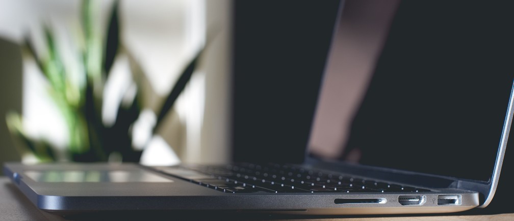 A side view of a laptop. Image: Photo by Mark Solarski on Unsplash