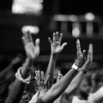 Photo showing people raising hands up PHOTO | https://www.pexels.com/@jibarofoto