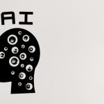 A digital art render of the word "AI" with a silhouette of a side-profile