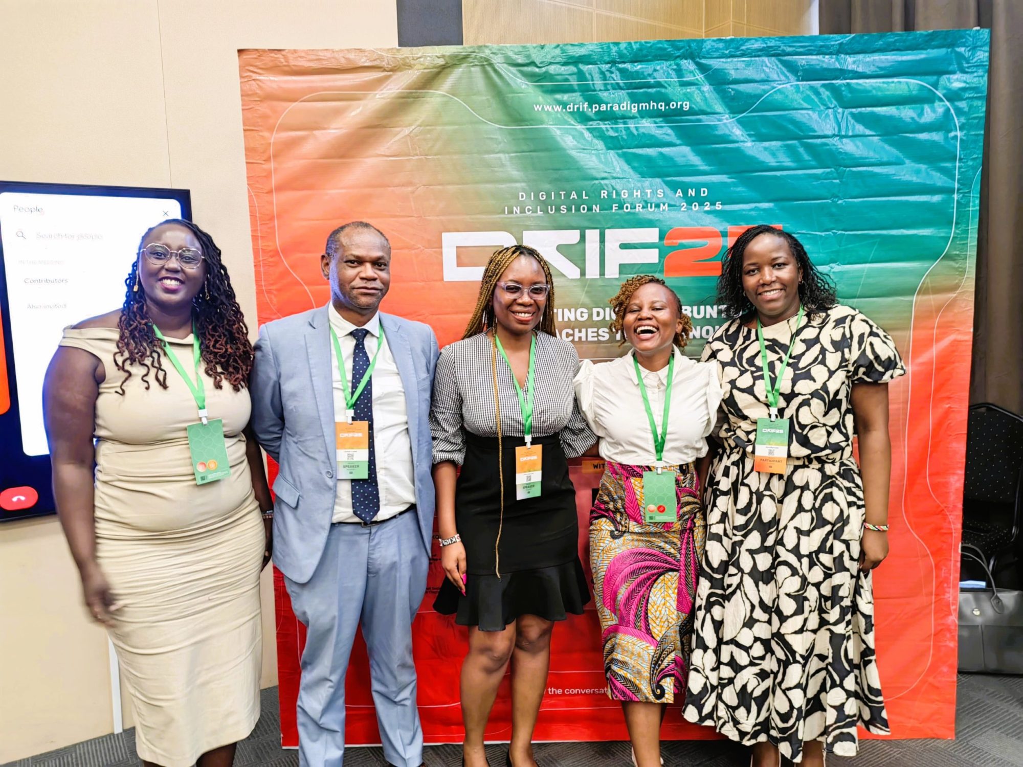 From left, Catherine, Likando, Florence, Cherie and Irene are posing for a photo and smiling.