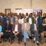 Participants in a group photo during the Policy Consultation Roundtable on Regulating Kenya’s Gig Economy, convened by GIZ and KICTANet