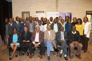 Participants in a group photo during the Policy Consultation Roundtable on Regulating Kenya’s Gig Economy, convened by GIZ and KICTANet